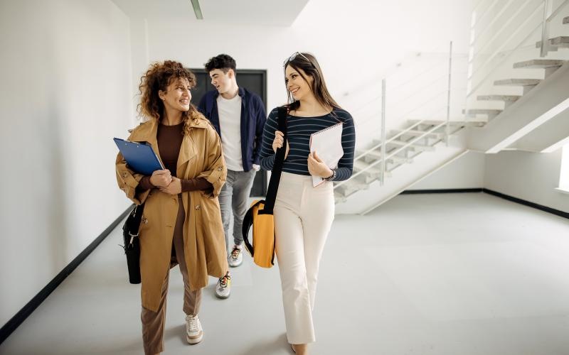 a group of people walking down a flight of stairs